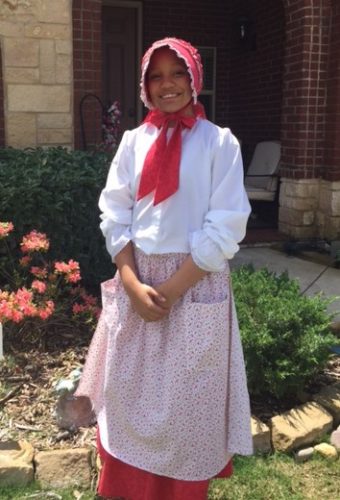 Teenager in LDS pioneer trek costume