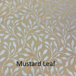 Mustard yellow women’s temple bag with leaf design, long handles, and zippered compartments