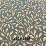 Sage green LDS temple garment bag with leaf pattern, front pocket, and zipper closure