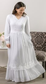 Woman wearing the Edinburgh LDS temple dress with front zipper, long sleeves, and modest fit