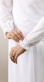 Lightly textured and versatile LDS temple top. Goes with any skirt changing up your look.