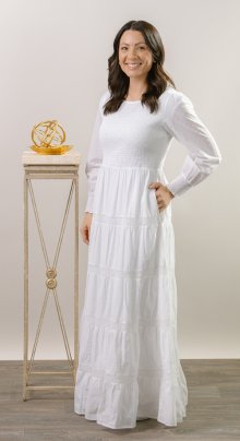 100% cotton shell with a light poly lining. LDS temple dress. Smocked top with a back zipper. 2 deep pockets.